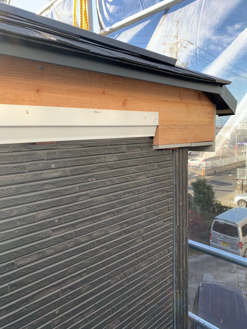 新築サイディング施工の様子"